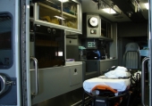Rear view.  Monster Medic hydrolic cot, Zoll M-Series monitor with pacing, 12-lead, capnography.