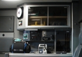 Curbside door view.  Zoll M-Series monitor, PlumXL IV pump